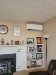 A mini-split air conditioning unit installed in a living room by Pacheco Air Conditioning and Heating LLC in Albuquerque, NM.