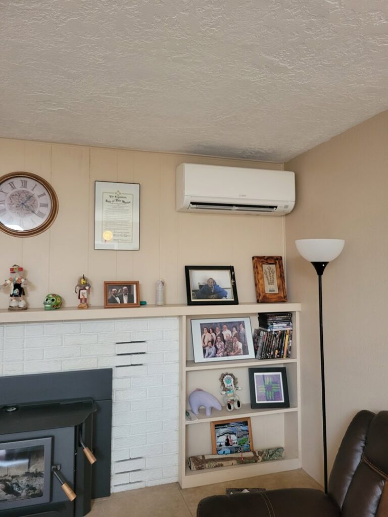 A mini-split air conditioning unit installed in a living room by Pacheco Air Conditioning and Heating LLC in Albuquerque, NM.
