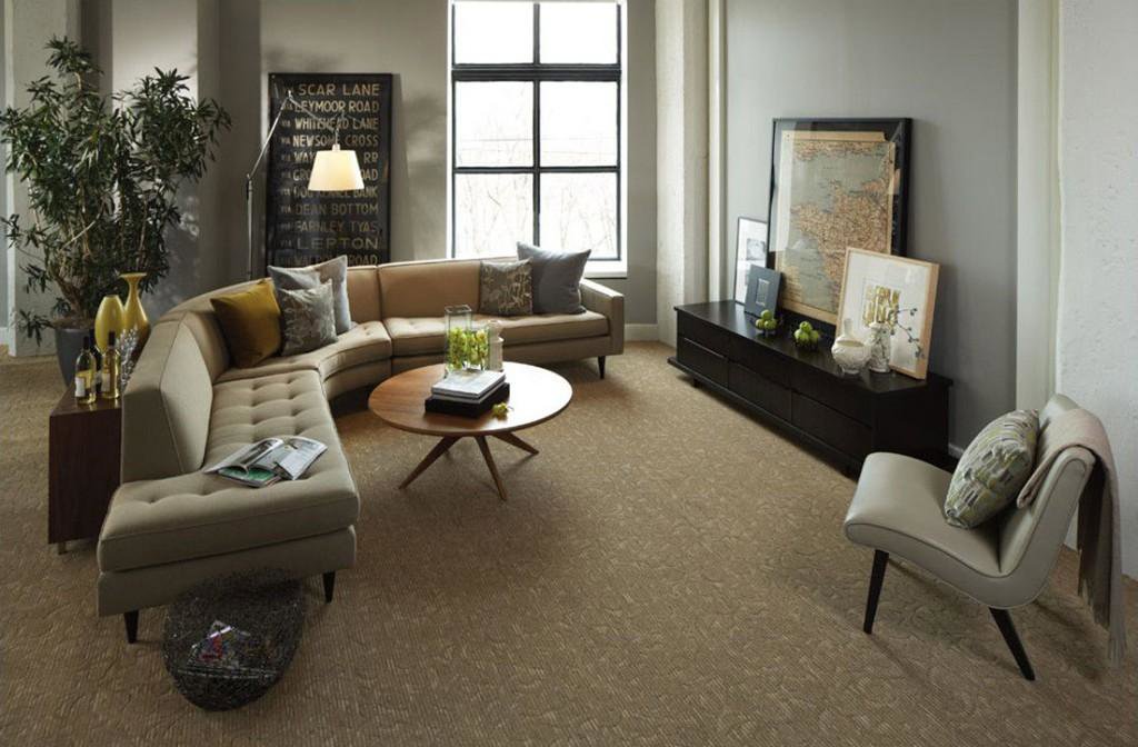 A modern living room featuring a newly installed patterned carpet by McFarland's Flooring EnCounters in Tacoma, WA.