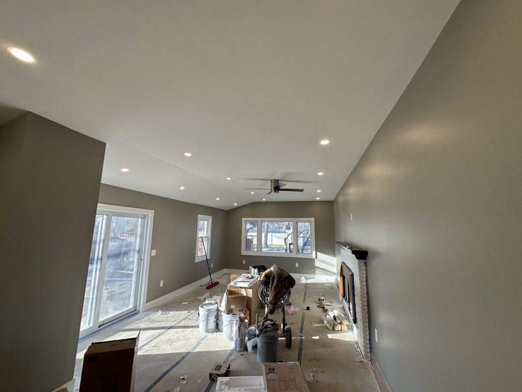 Living room with newly installed recessed lighting and a ceiling fan by Electric R US LLC in Dearborn, MI.
