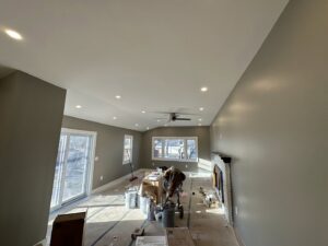 Living room with newly installed recessed lighting and a ceiling fan by Electric R US LLC in Dearborn, MI.