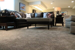 A cozy living room featuring newly installed wall-to-wall carpet by Rich's Modern Flooring in Billings, MT.