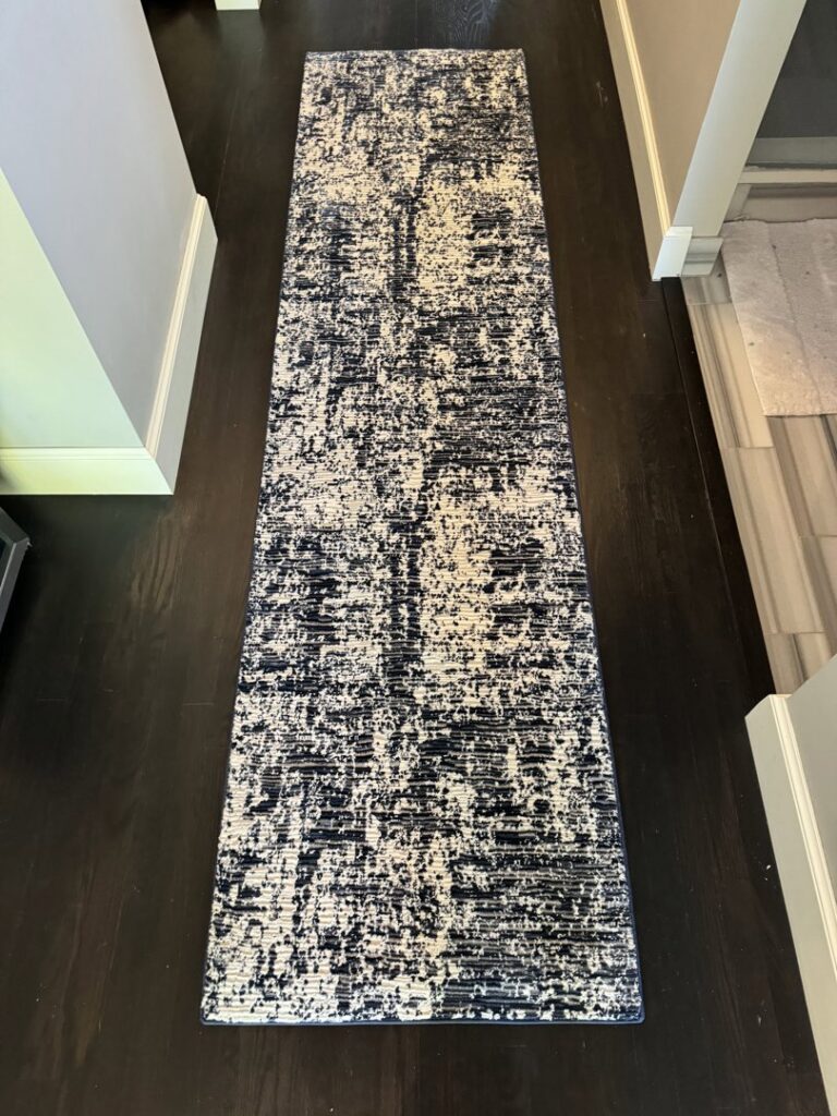 A long abstract pattern hallway runner with bound edges, installed by Carpet Binding By Scott in Oklahoma City, OK