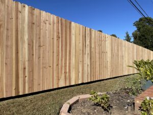 A long, newly installed wood privacy fence providing boundary and seclusion by 985 Fence, LLC in Schriever, LA.
