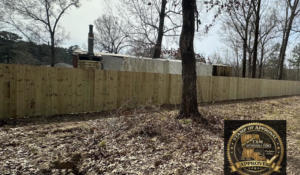 A long section of new wood privacy fence installed by C & M Affordable Fence, LLC in Haughton, LA