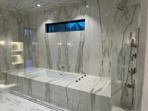 Luxury bathroom with modern lighting fixtures installed by Trizone Electric, LLC in Houston, TX.