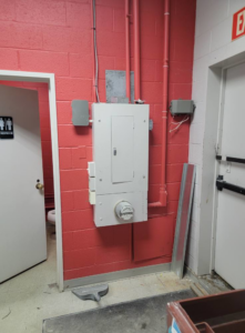 Main electrical distribution panel and meter installed on a red brick wall by BESTA in Perkasie, PA.