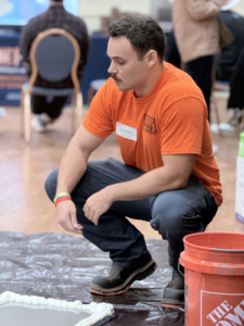 A man performing floor preparation work for Dependable, LLC in Woodinville, WA.
