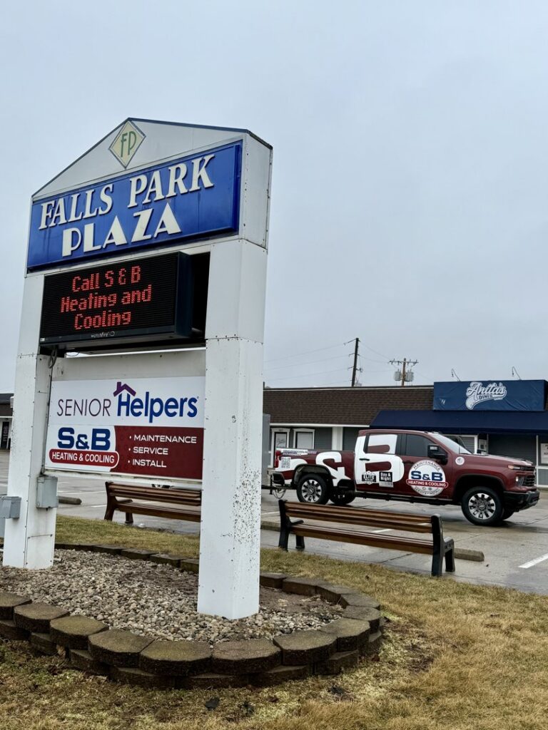 A manometer being used to test an HVAC unit by S&B heating and cooling in Florence, KY.