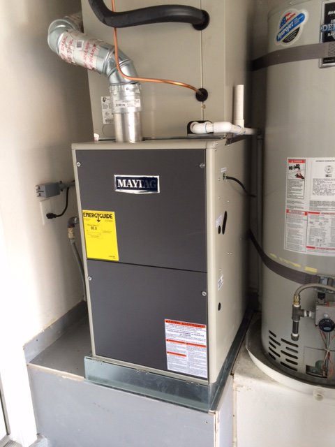 A Maytag furnace and indoor HVAC unit installed by AC Plus Heating & Air Conditioning Service, providing service in Las Vegas, NV.