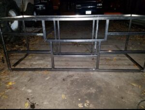 A metal gate frame under construction in a workshop by Integrity Gates and Fencing in Yakima, WA