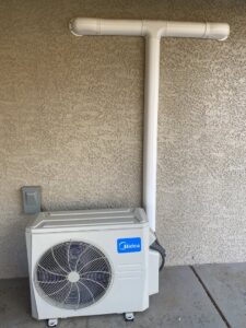 A newly installed Midea mini-split outdoor unit by Modern Air Conditioning & Heating in Boulder City, NV.