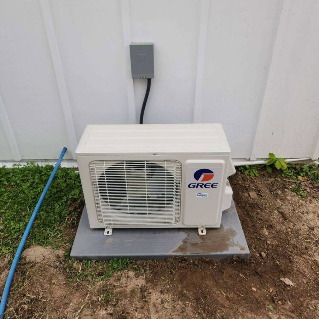 A newly installed GREE mini-split outdoor AC unit by Faith Heat and Cool in West Monroe, LA