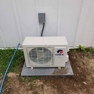 A newly installed GREE mini-split outdoor AC unit by Faith Heat and Cool in West Monroe, LA