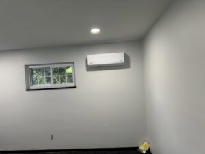 Mini-split air conditioning unit installed on a wall by Breyer's Heating & Air Conditioning in Belleville, MI