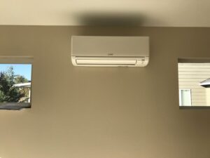 A newly installed mini-split air conditioning unit on a wall by Columbia Heating & Air Conditioning in Kent, WA.