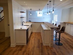 A newly installed mini-split AC unit in a finished basement bar area by Home Solutions Center in Bethlehem, PA.