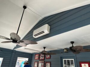 An indoor mini-split air conditioning unit installed on a wall, showcasing services by Netherland Air Conditioning LLC in Mobile, AL.
