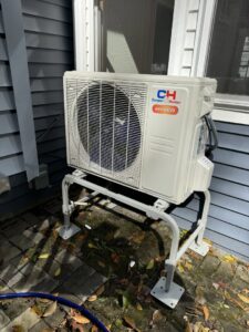 An outdoor Cooper & Hunter mini-split condenser unit on a stand by Russell Climate Solutions in Schenectady, NY.