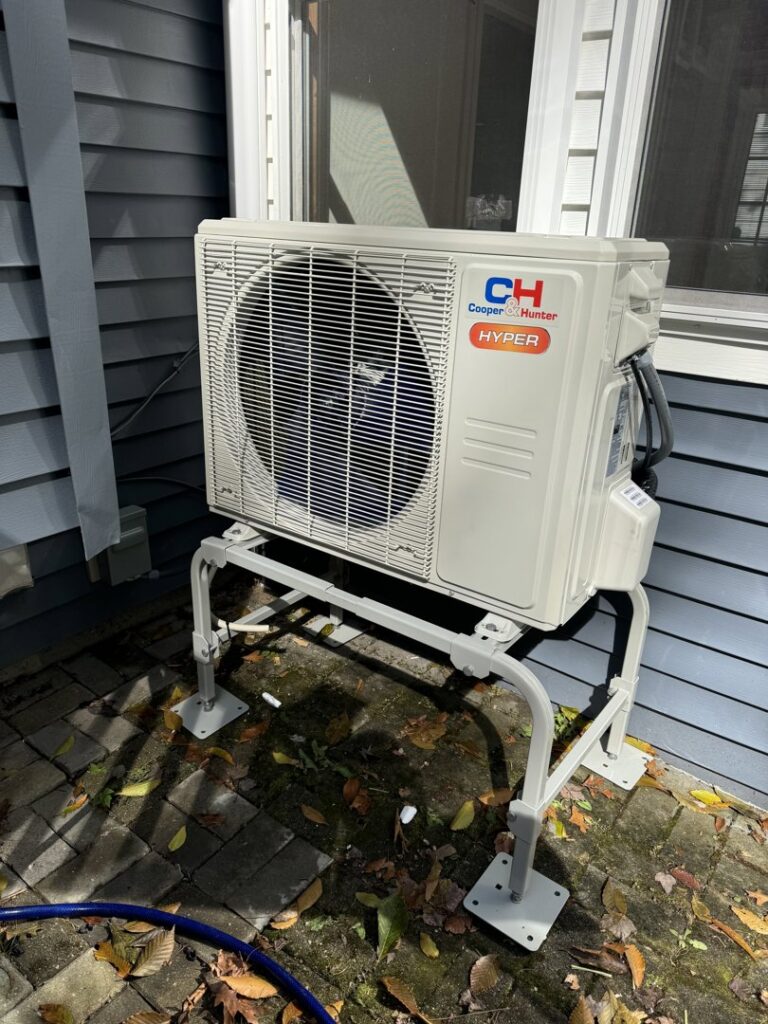 An outdoor Cooper & Hunter mini-split condenser unit on a stand by Russell Climate Solutions in Schenectady, NY.