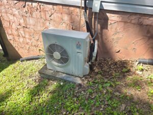 An outdoor mini-split condenser unit installed by Bruce Heating & Air in Kennewick, WA.
