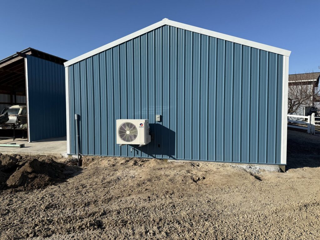 An outdoor mini-split condenser unit installed by Kingdom Heating and Air in Sacramento, CA.