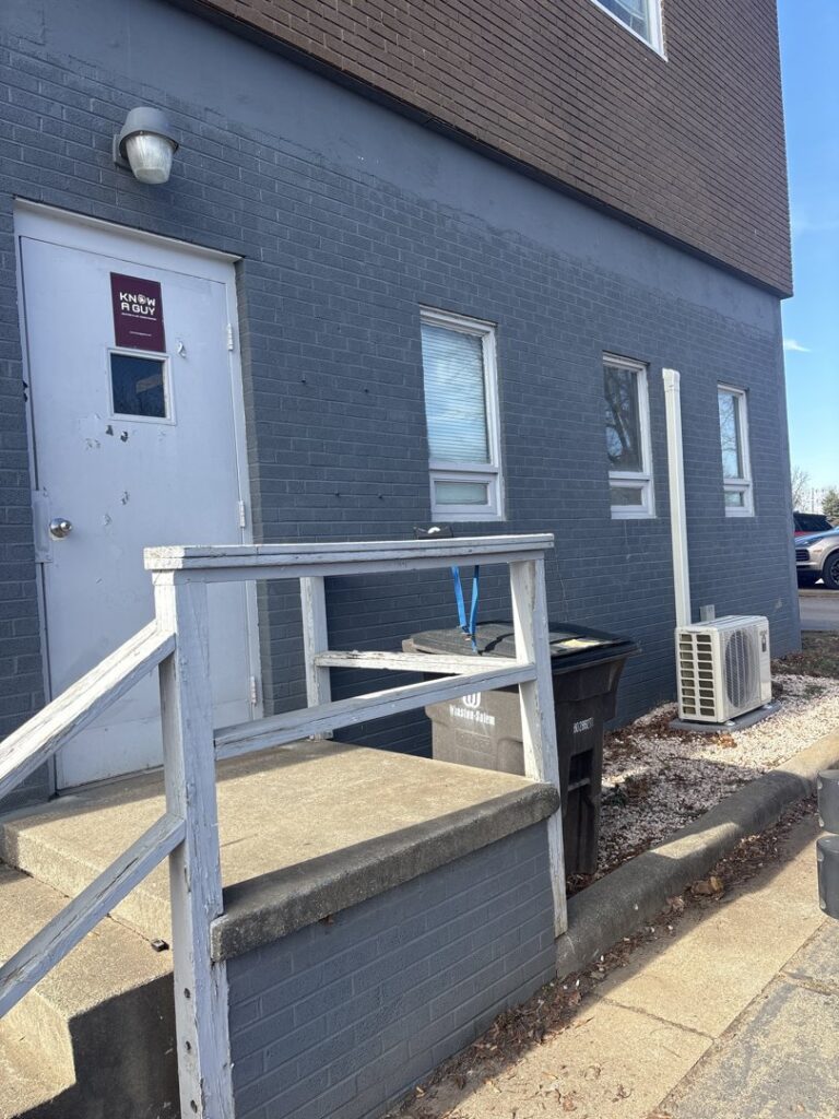 A newly installed outdoor mini-split HVAC unit on the side of a building by Know A Guy Heating & Air Conditioning in Kernersville, NC.