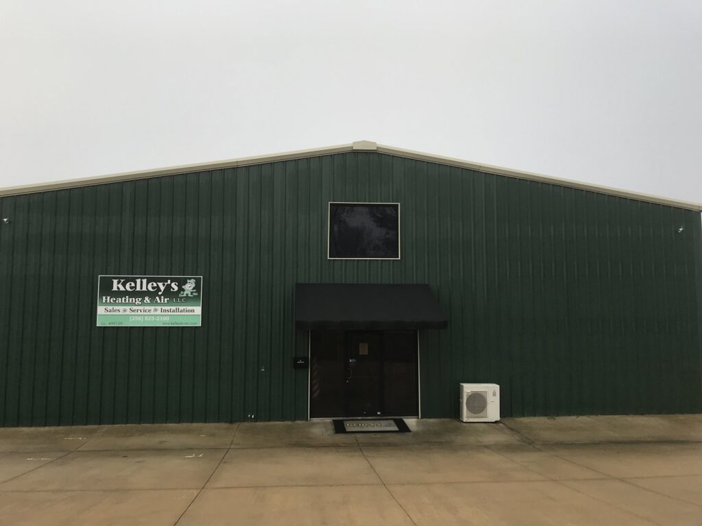 A mini-split HVAC condenser unit installed outside the Kelley's Heating & Air building in Dadeville, AL