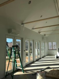 Multiple mini-split HVAC indoor units installed in a new construction room by R & R H.V.A.C in Knoxville, TN.