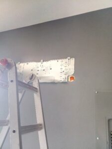 A wall-mounted bracket and wiring for a mini-split indoor unit installation by Ace A/C & Heating in Henderson, NV.