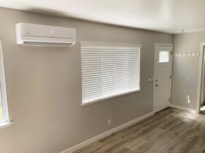 A mini-split indoor HVAC unit installed on a wall by Blue Collar HVAC in Las Vegas, NV.