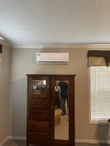 A ductless mini-split indoor unit installed on a wall in a room by Circle L Heating and Cooling LLC in Atmore, AL.