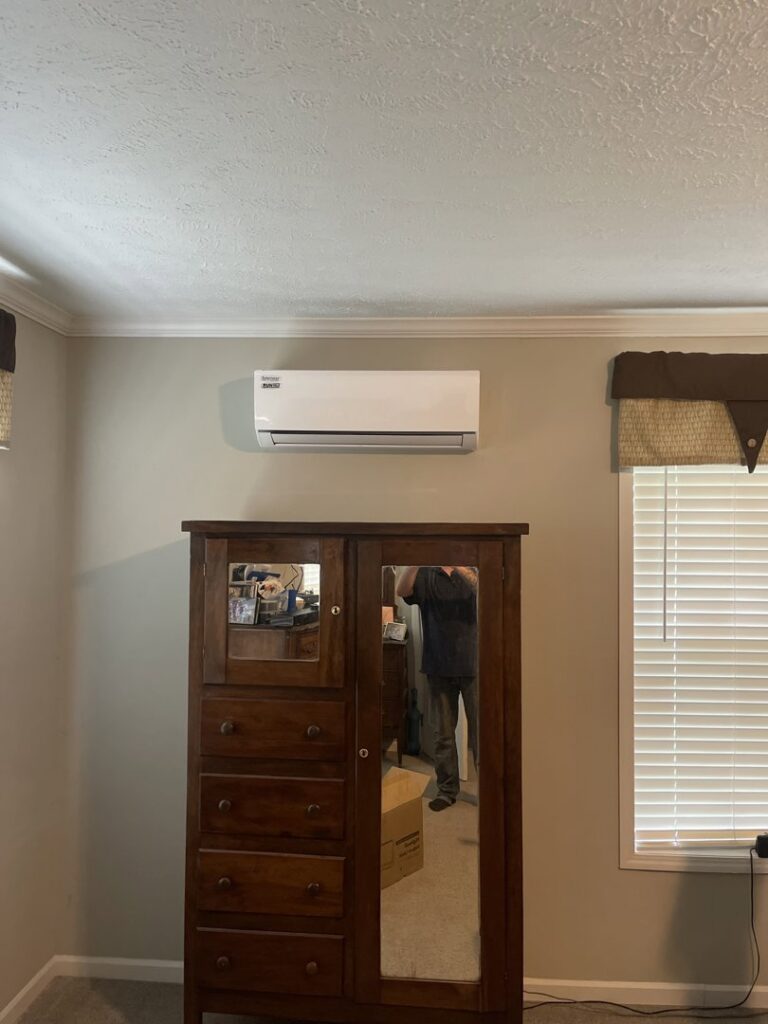 A ductless mini-split indoor unit installed on a wall in a room by Circle L Heating and Cooling LLC in Atmore, AL.