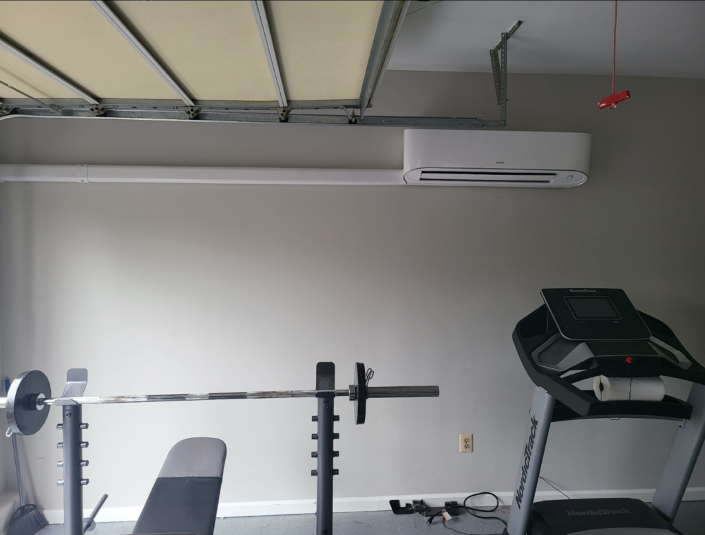 A wall-mounted mini-split indoor unit installed by Zibi Construction in Mount Prospect, IL.