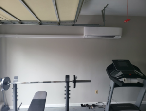 A wall-mounted mini-split indoor unit installed by Zibi Construction in Mount Prospect, IL.