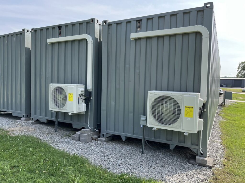 Two outdoor mini-split HVAC units installed on a commercial building by ACE Heating & Cooling, Inc. in Jonesboro, AR