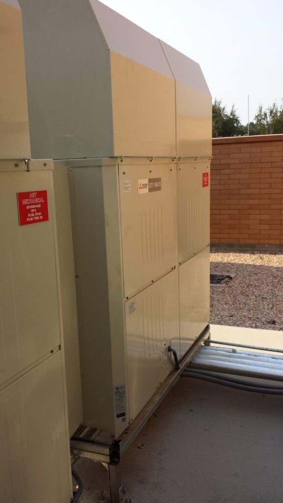A Mitsubishi Electric CITY MULTI HVAC unit with ABT Mechanical branding, installed by ABT Heating and Cooling in Orem, UT.