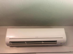 An indoor Mitsubishi Electric mini-split unit installed by HVAC Experts, LLC in Edmond, OK.