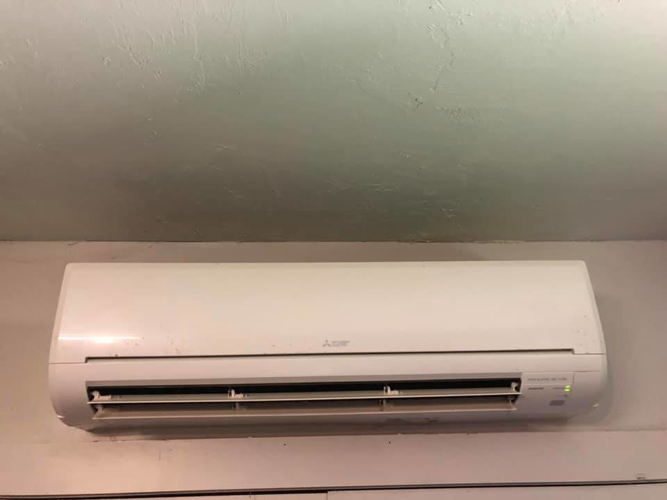 An indoor Mitsubishi Electric mini-split unit installed by HVAC Experts, LLC in Edmond, OK.