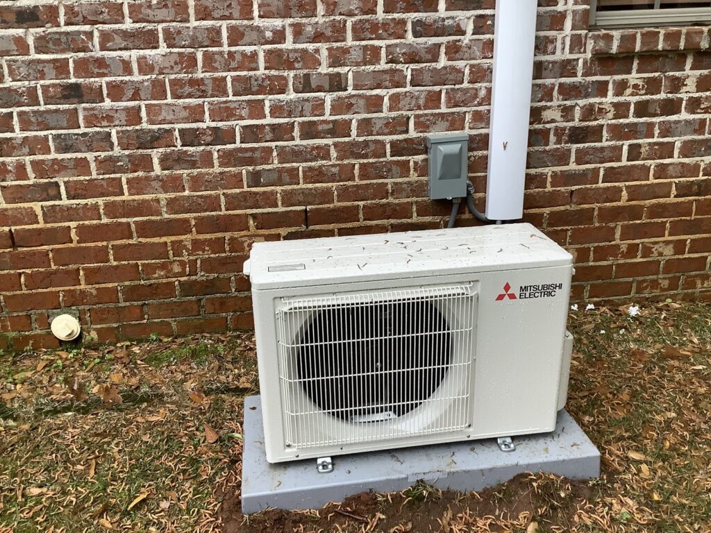 A newly installed Mitsubishi Electric mini-split outdoor unit by Bob Woodall Air Care Systems in Dothan, AL.