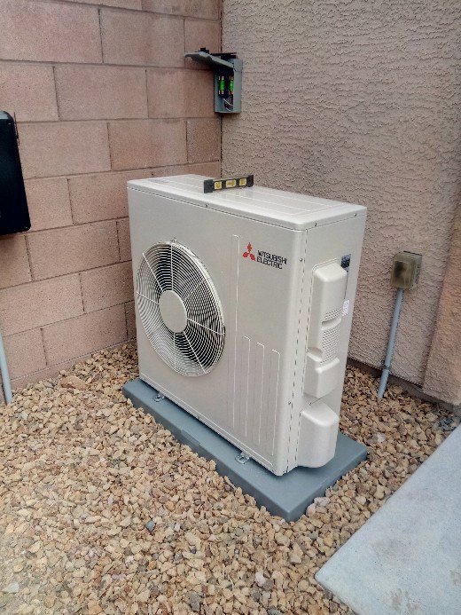 A newly installed Mitsubishi Electric mini-split outdoor condenser unit by Ace A/C & Heating in Henderson, NV.