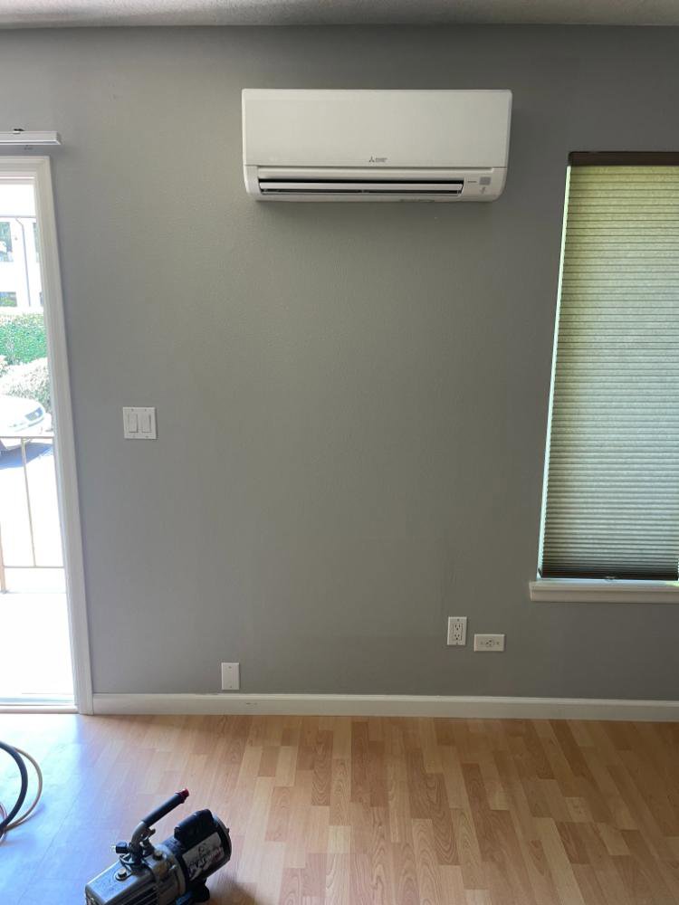 A Mitsubishi mini-split indoor unit installed in a finished room by Smart HVAC LLC in Vancouver, WA.