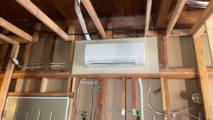 A Mitsubishi mini-split indoor unit being installed during construction by Smart HVAC LLC in Vancouver, WA.