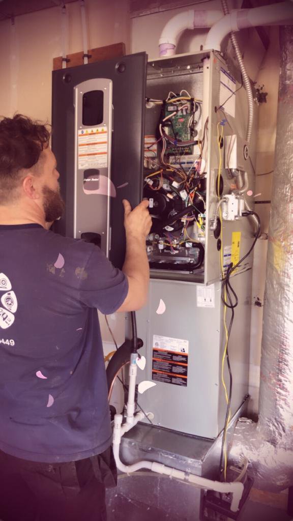 A Mitsubishi mini-split outdoor unit installed by Dynamic Utility Services, Inc. Heating, A/C & Refrigeration in Shoreline, WA.