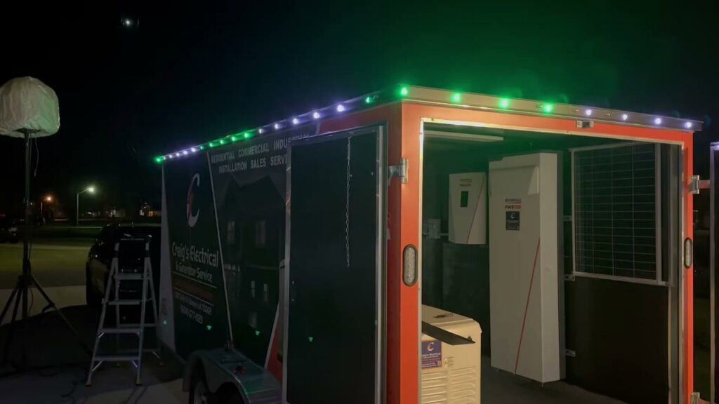 The interior of a mobile service trailer, equipped with electrical components and solar panels, used by Craig's Electrical and Generator Service in Kenner, LA.