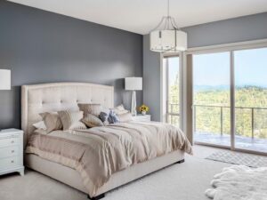 A modern bedroom with soft, light-colored carpet installed by Floors Touch in McKinney, TX.