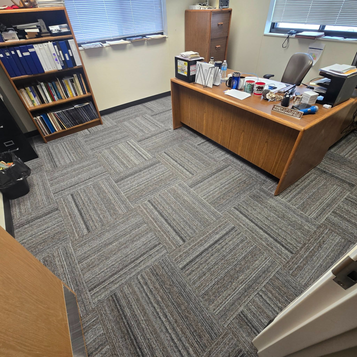 Modern grey carpet tile flooring installed in an office by LaValle Flooring Inc - Valley City in Valley City, ND.