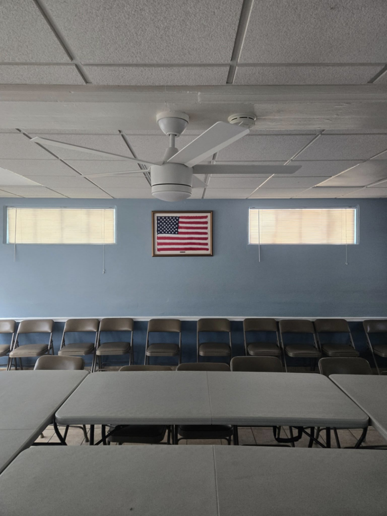 A newly installed modern white ceiling fan in a room by Crawford Electric Services, LLC in Kings Mountain, NC.