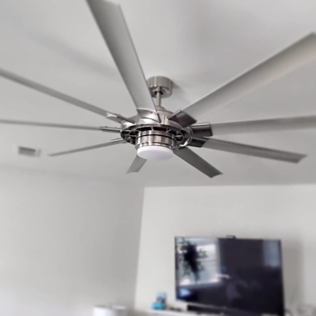A modern ceiling fan with an integrated light fixture installed by J3 Services in Goose Creek, SC.