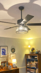 A modern ceiling fan with a light fixture professionally installed by Ross Electric Company in Arlington, TN.